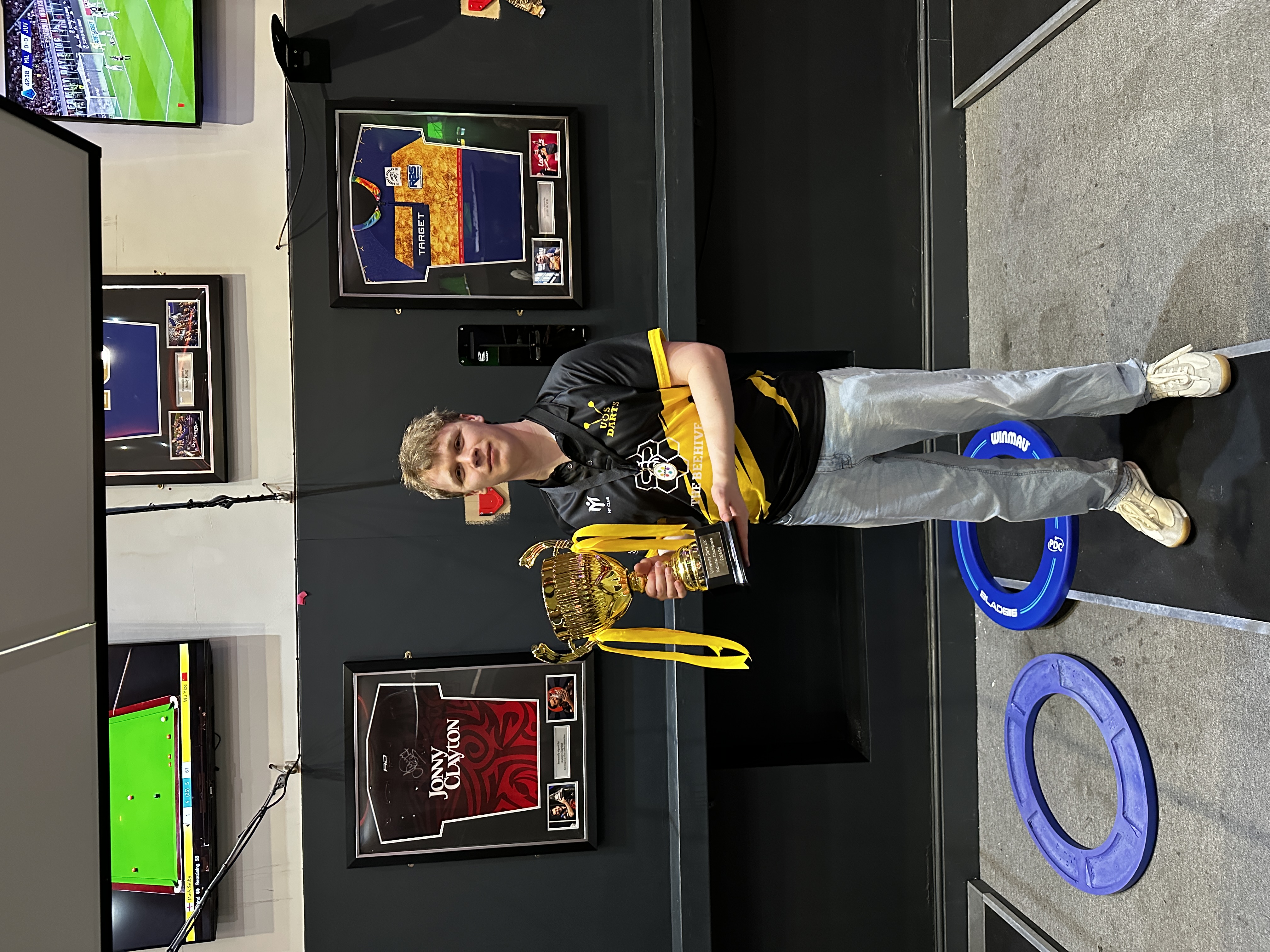 Celebrating the National University Darts Championship team victory